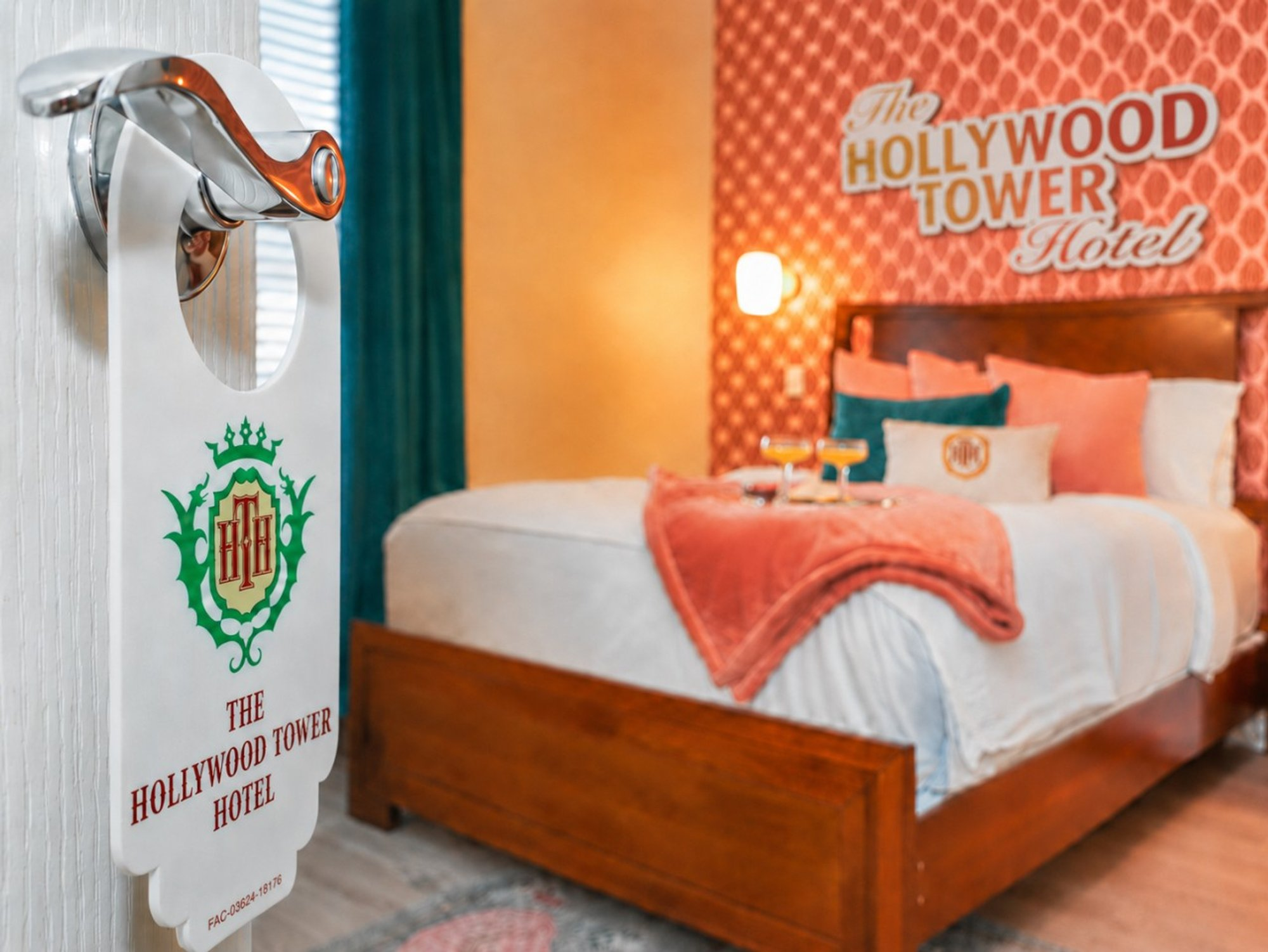 Bedroom 1, Hollywood Studios theme: queen bed beside the Hollywood Tower Hotel wall