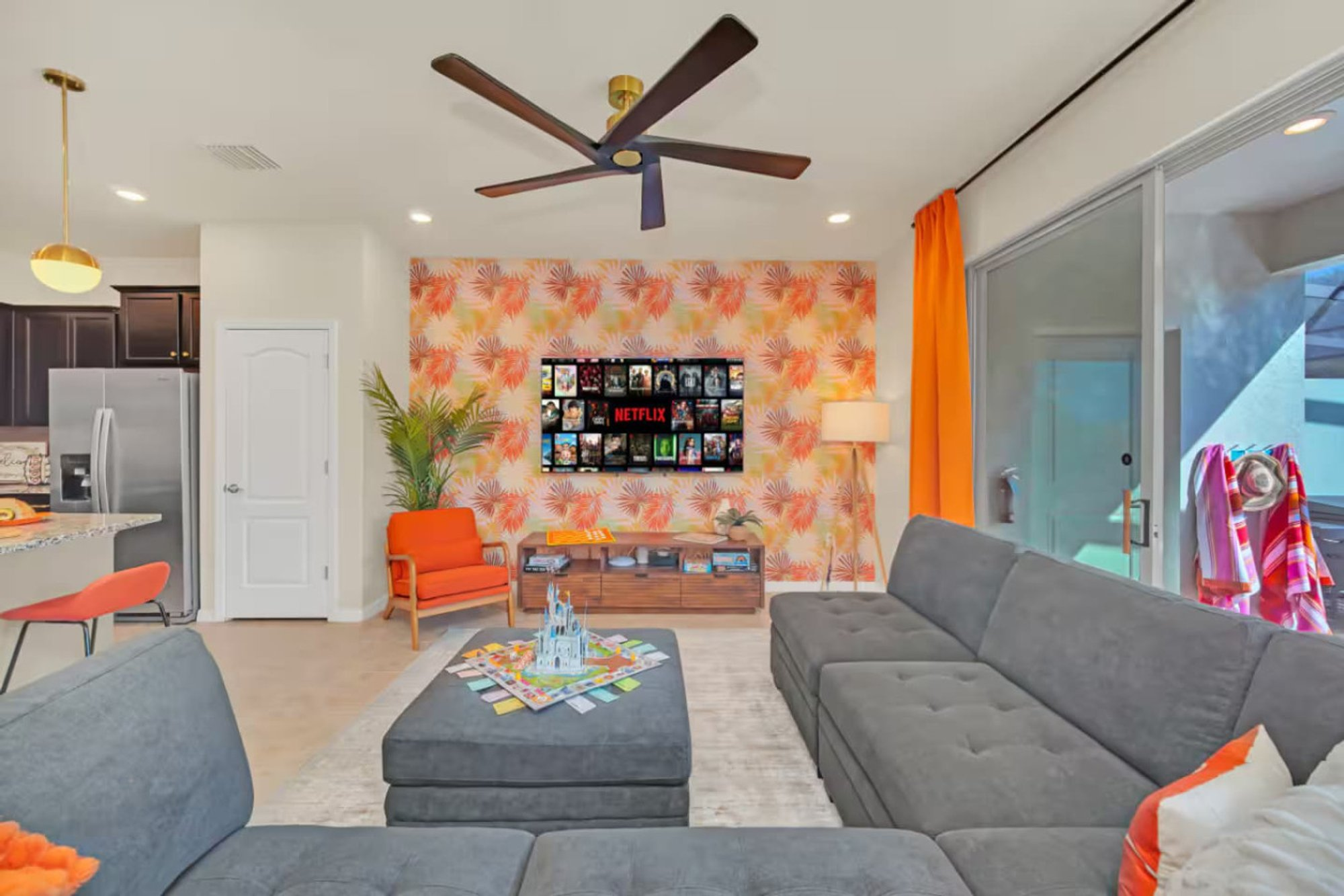 Living room looking toward the lanai and pool
