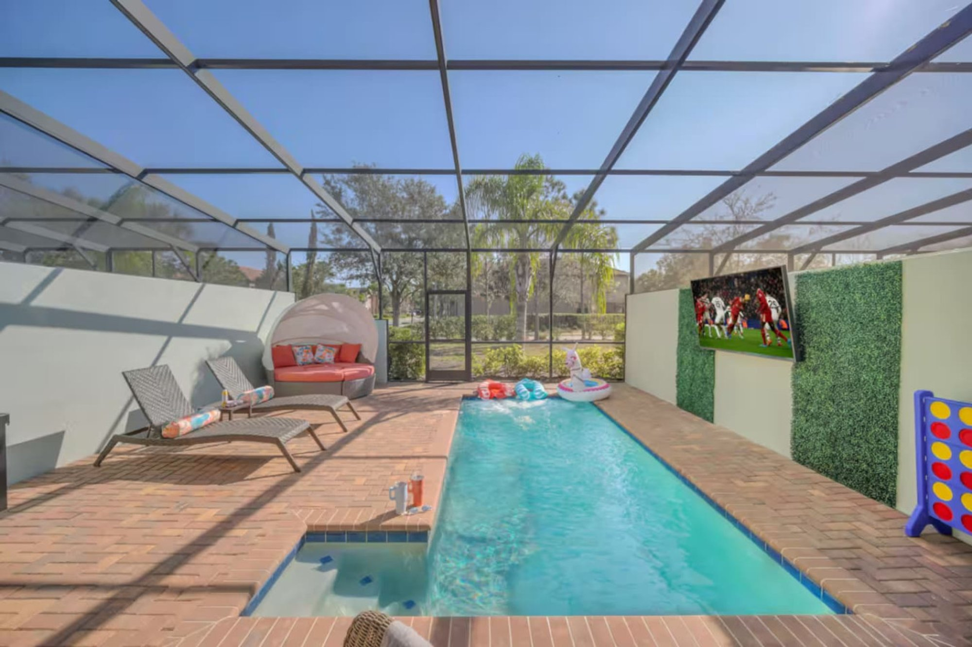 The private pool inside its screened lanai