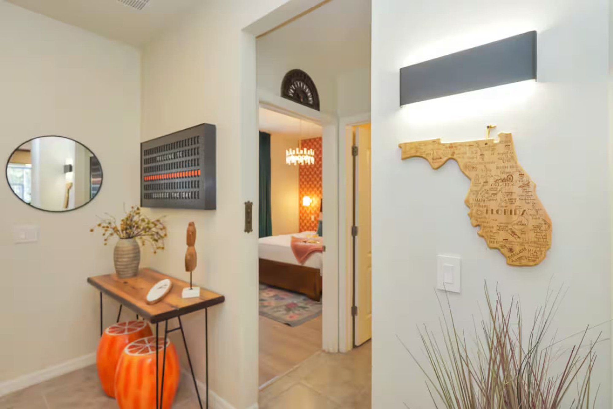 Entry table with a wooden Florida cutout on the wall