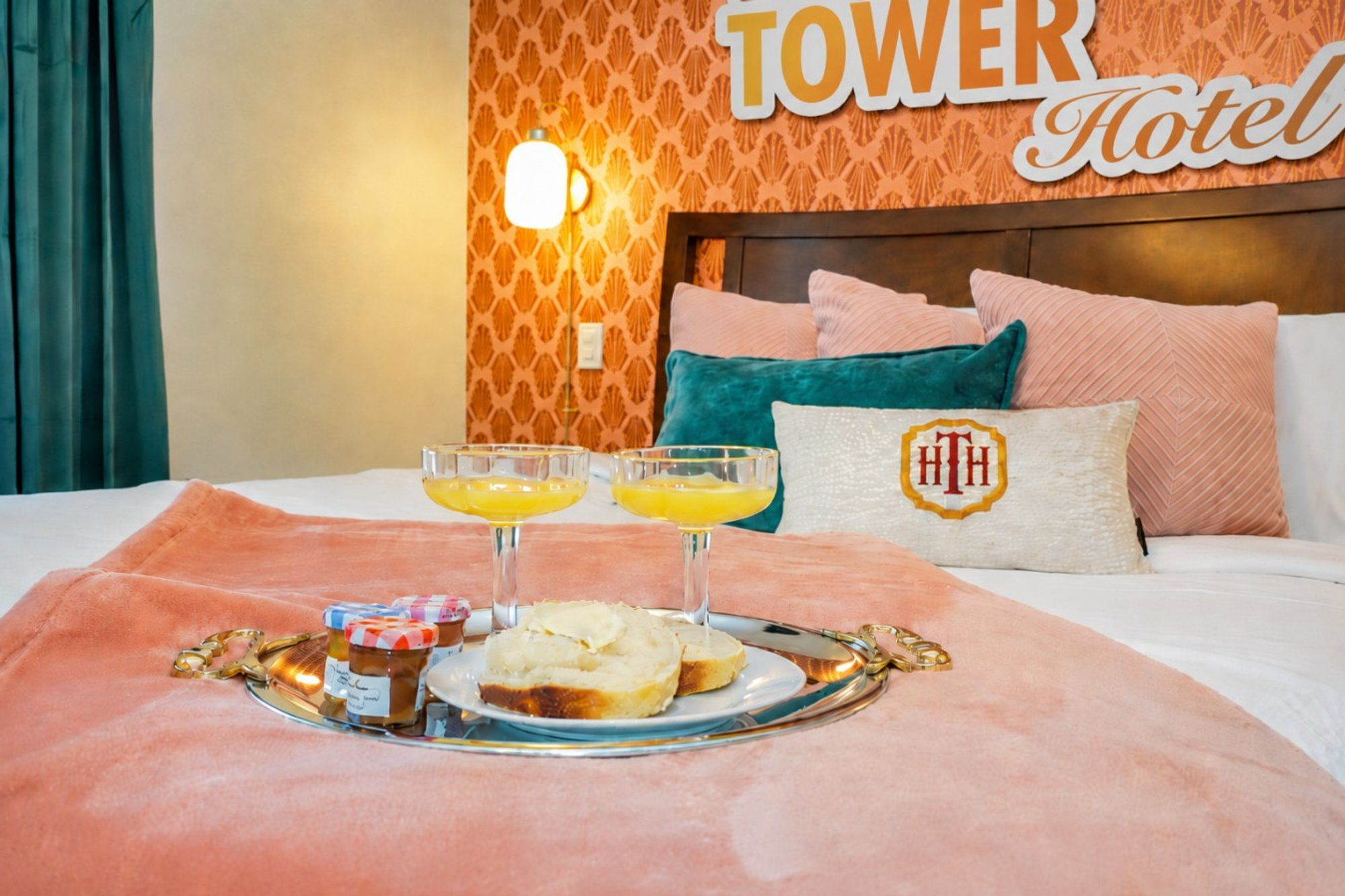 Breakfast tray on the queen bed in Bedroom 1