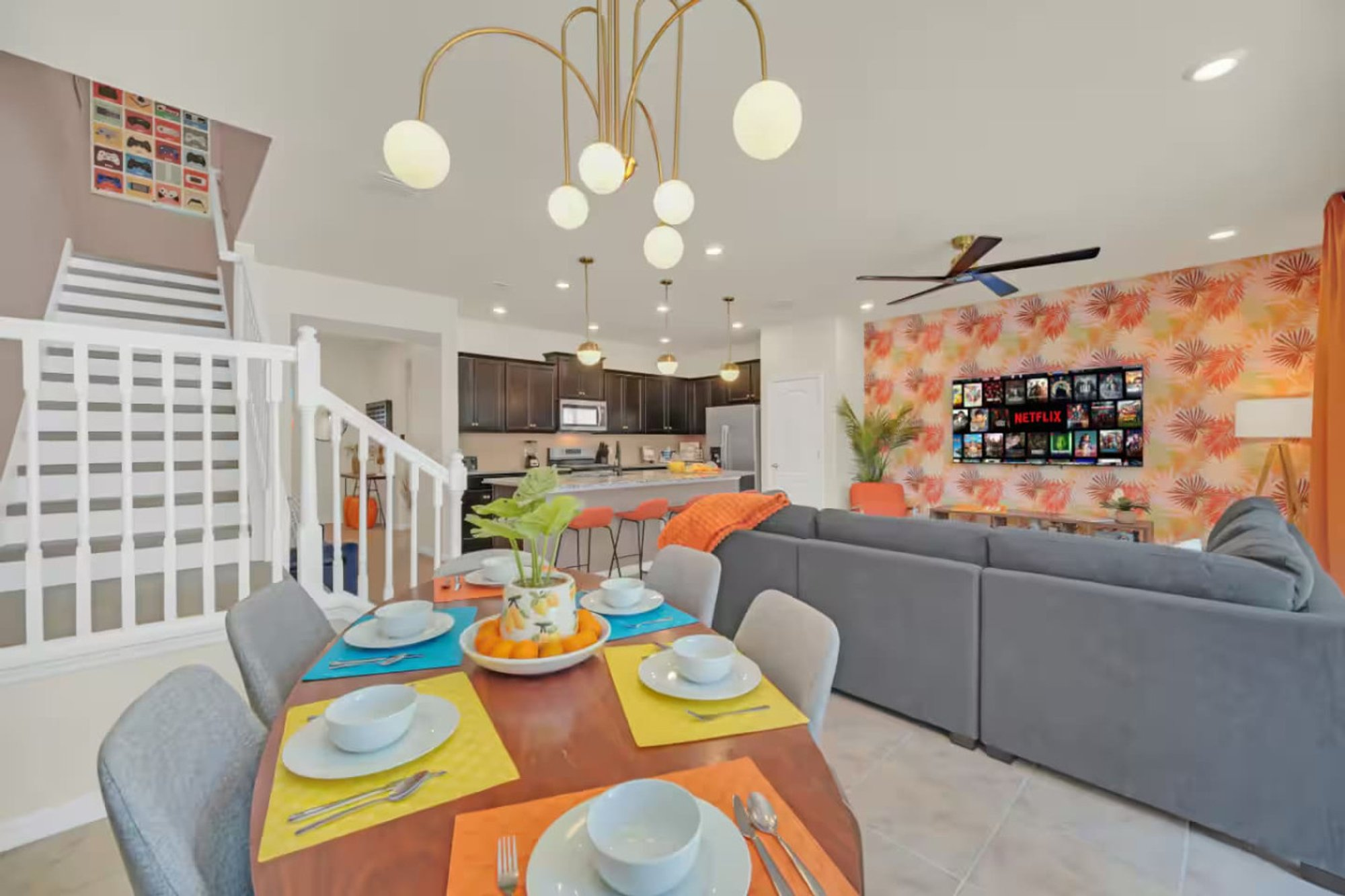 Dining table and the staircase to the game loft