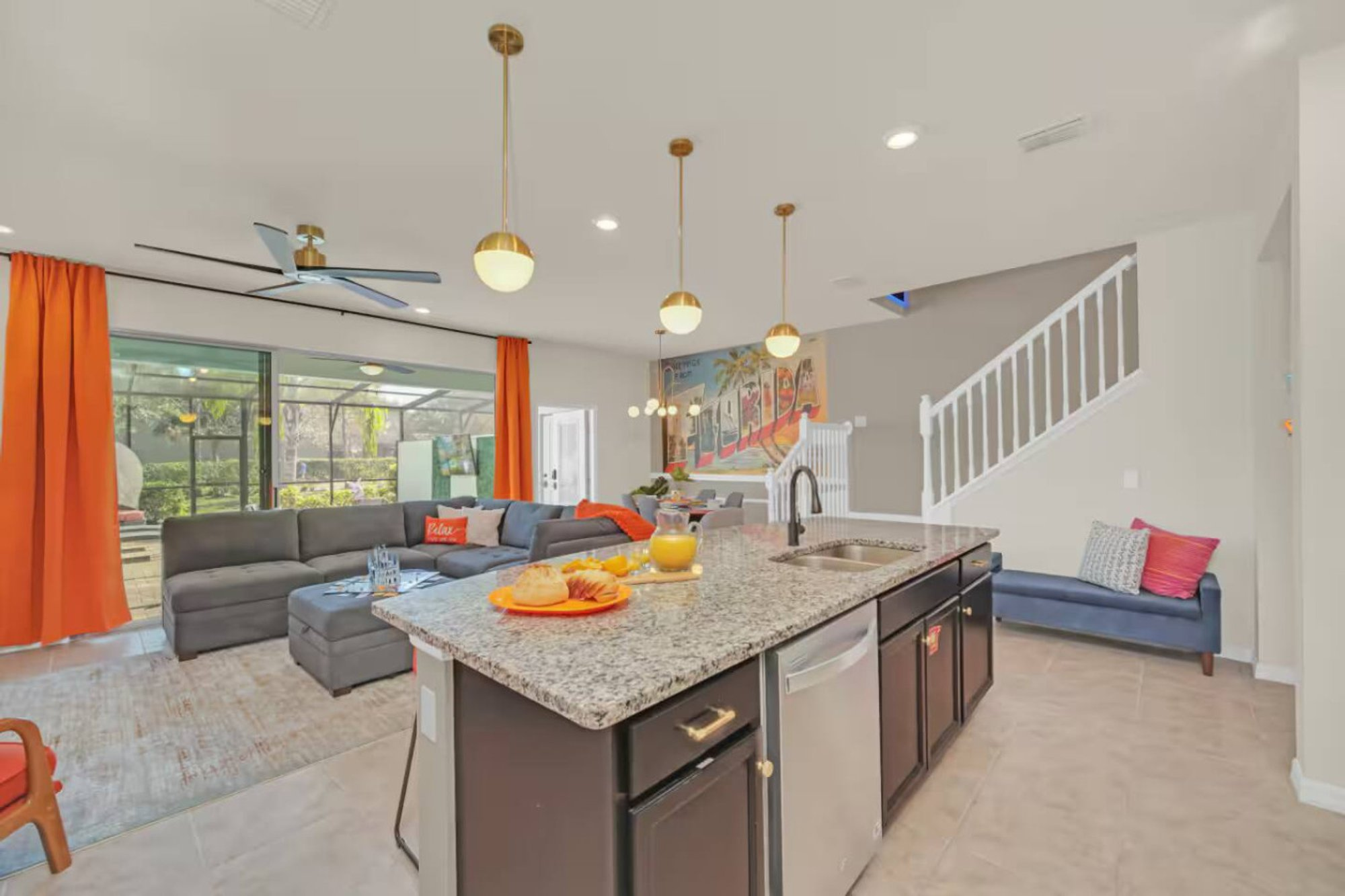 Open-plan living and kitchen with the stairs to the loft