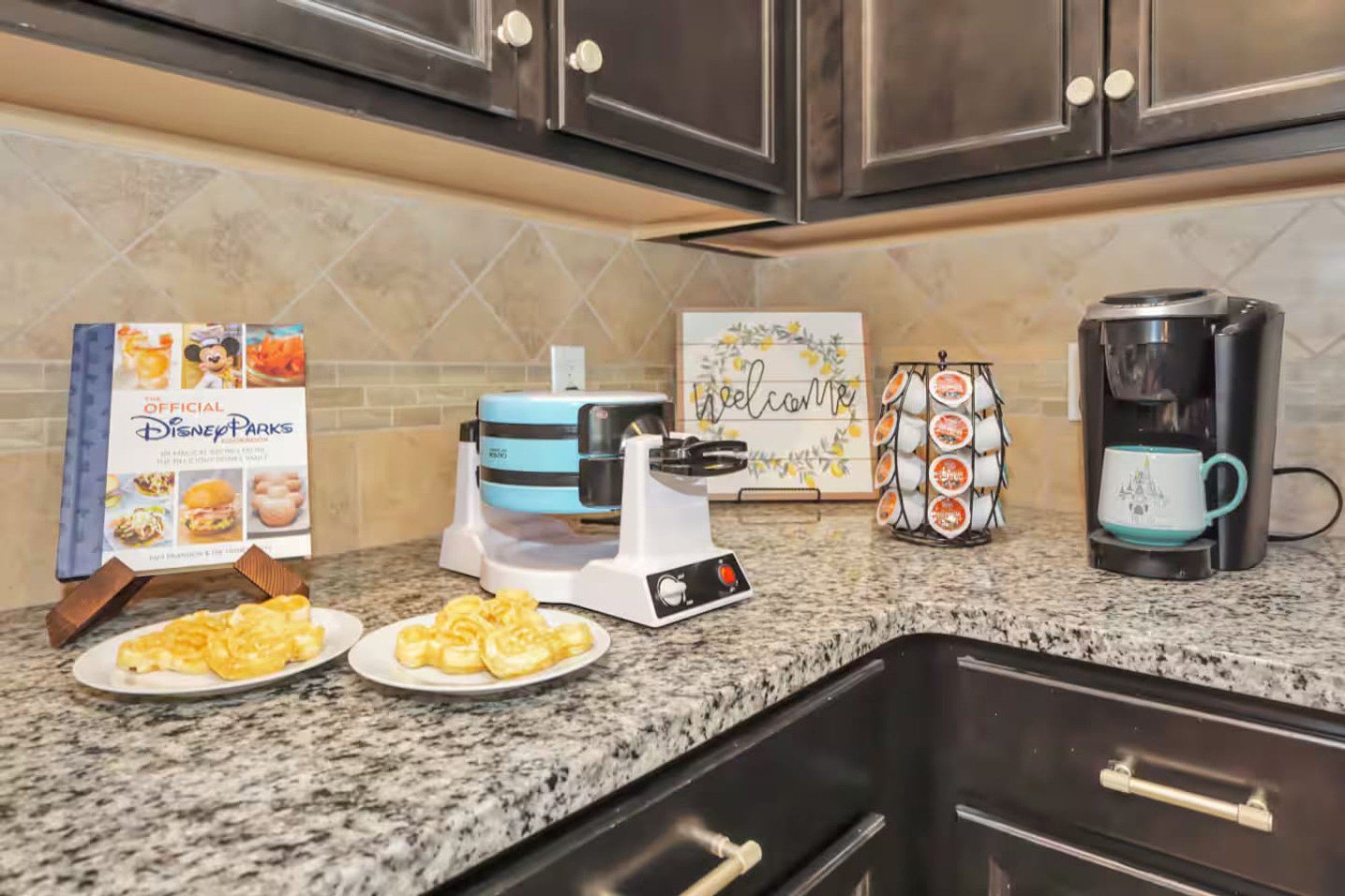 Coffee station with the Keurig, mugs and a Disney Parks book