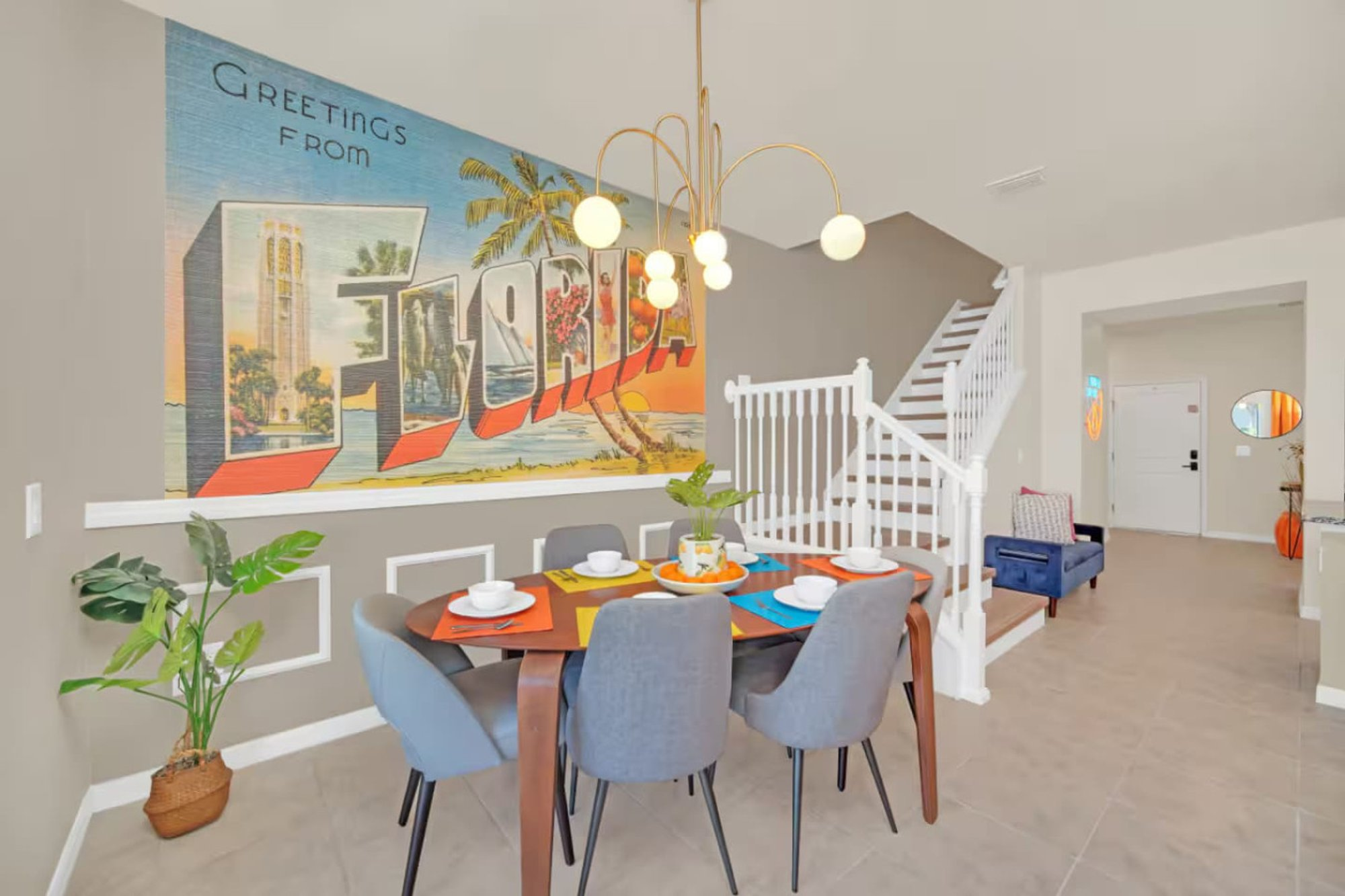 Dining nook beneath the painted mural